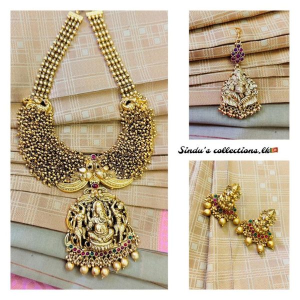 Exclusive antique gold long haram with earrings and tikkas